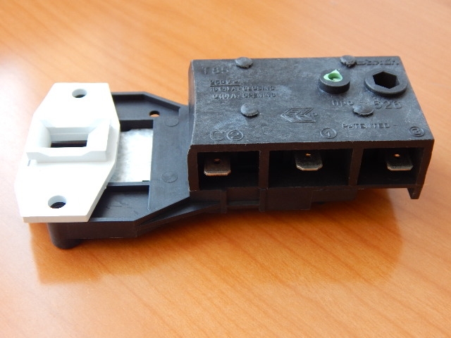 Блокировка люка Ariston, Indesit T85 (011140, 00225058)
